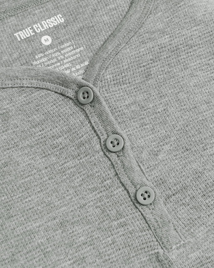 Girls Heather Gray Long Sleeve Boxy Waffle Henley with button-front detail.