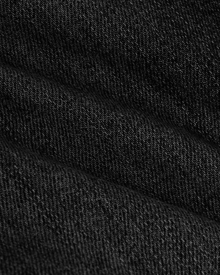 Close-up of Gray Wash Slim Authentic Denim Jeans, showcasing twill weave texture.
