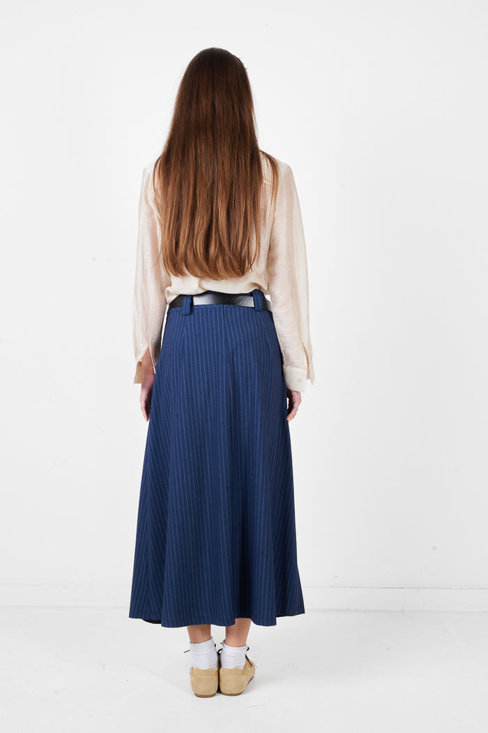 High waist pleated maxi skirt with subtle check pattern and fluid silhouette wholesale