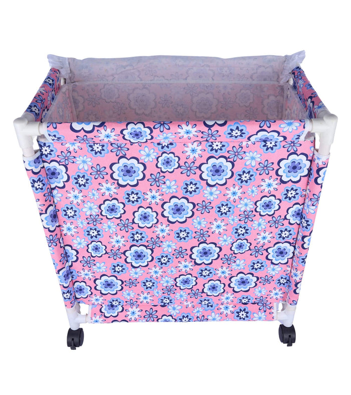 Fabric laundry hamper with lid cover opened, pink and blue floral pattern, wheeled base