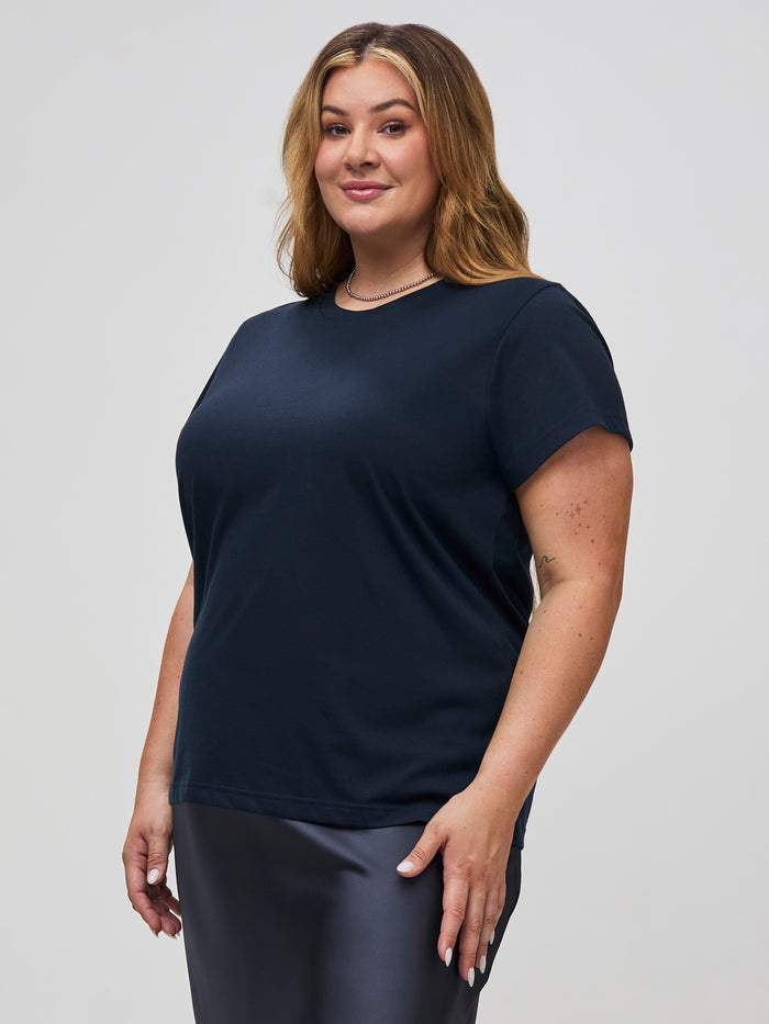 Vanessa is 5'10" and wears a size 2X # Women's Tees at Fresh Clean Threads | Dark Navy Crew Neck