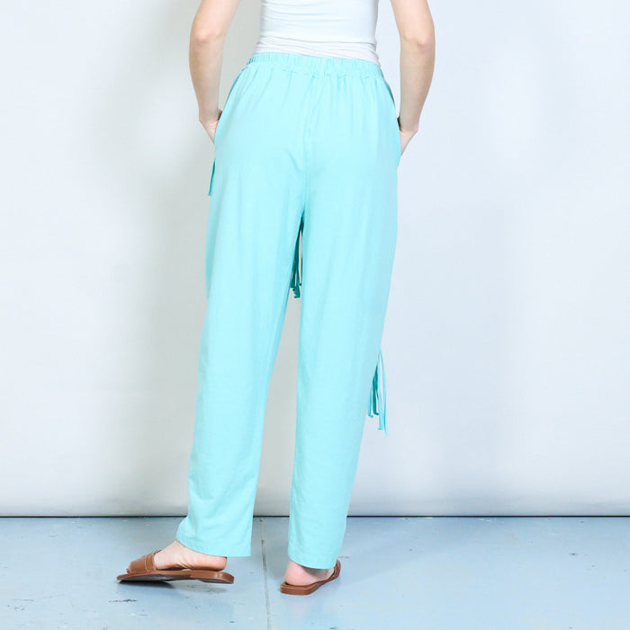Asymmetric fringe overlay relaxed fit trousers wholesale
