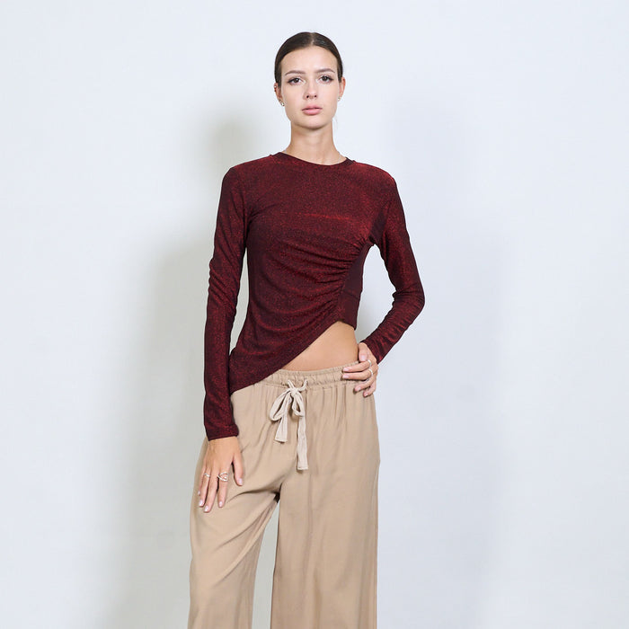 Asymmetric ruched glitter long sleeve top wholesale