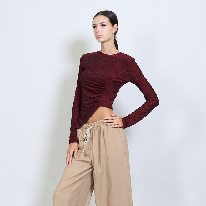 Asymmetric ruched glitter long sleeve top wholesale