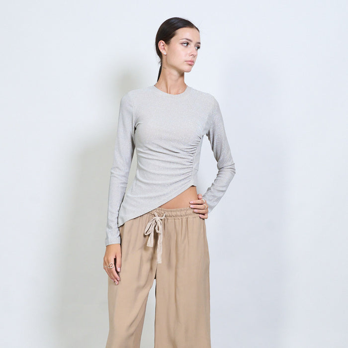 Asymmetric ruched glitter long sleeve top wholesale