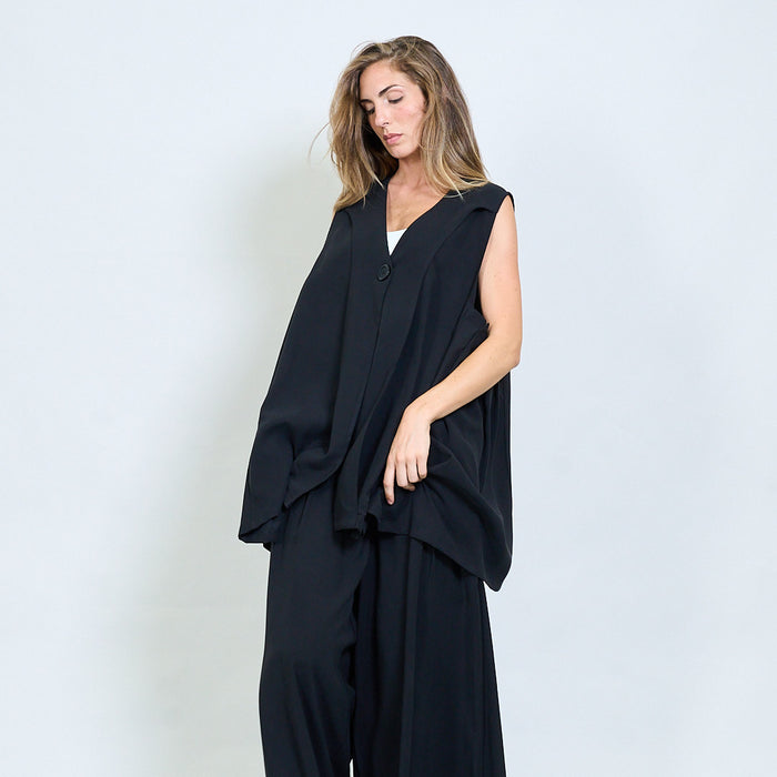 Asymmetric sleeveless vest with ruched tie details wholesale