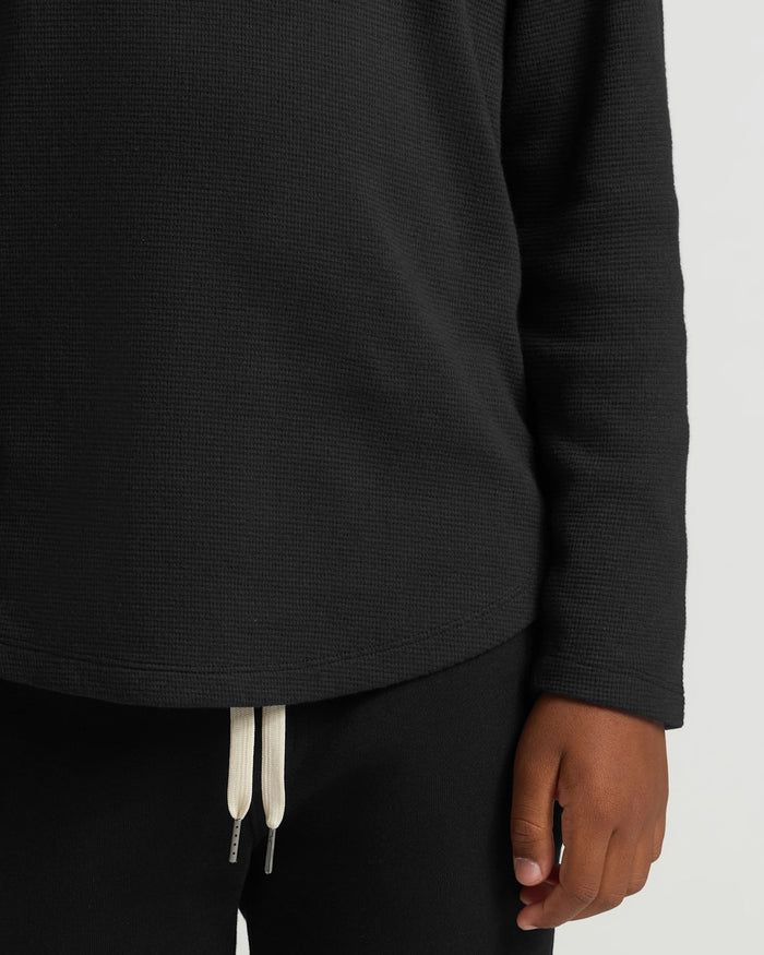 Boys Black Long Sleeve Waffle Henley in close-up, showing texture and fit.