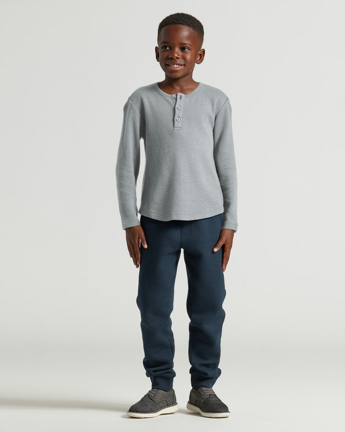 Boys Heather Gray Long Sleeve Waffle Henley on school-age boy.