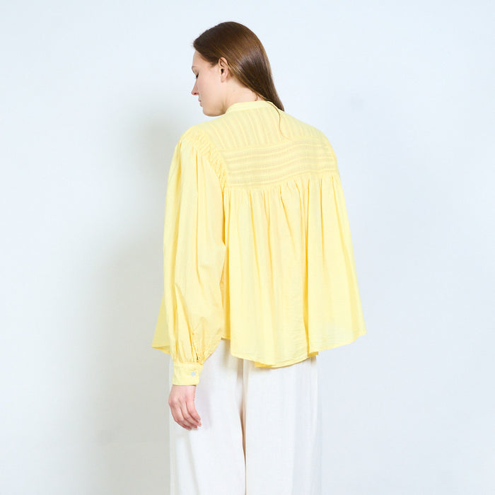 Button front blouse with pintuck yoke and gathered fit wholesale