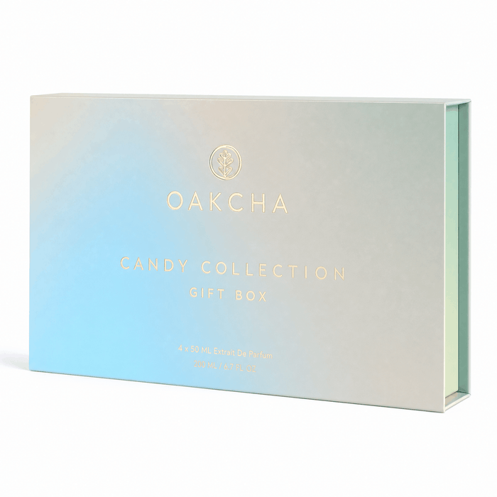 Front view of Candy Collection Gift Box Set showcasing iridescent pastel rectangular box with gold Oakcha logo on white background