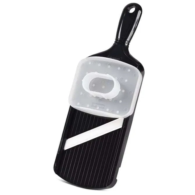 A black ceramic blade slicer with a vegetable holder and a double-edge blade.