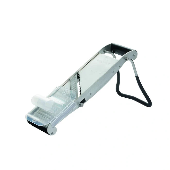 Metal vegetable peeler on a white background