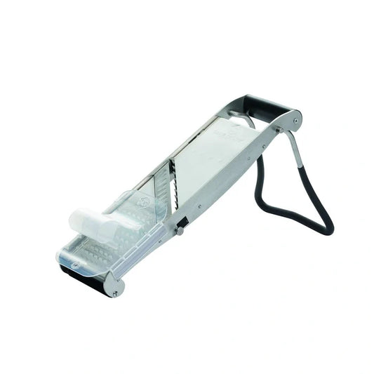 Metal vegetable peeler on a white background