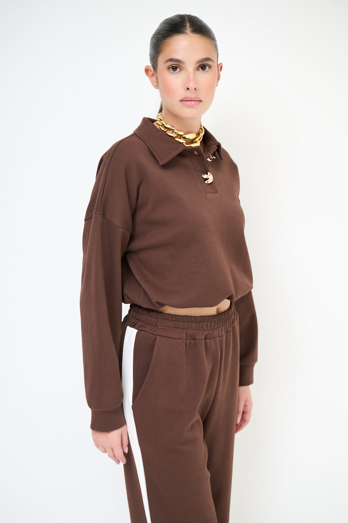 Cropped polo sweatshirt with gold button detail wholesale