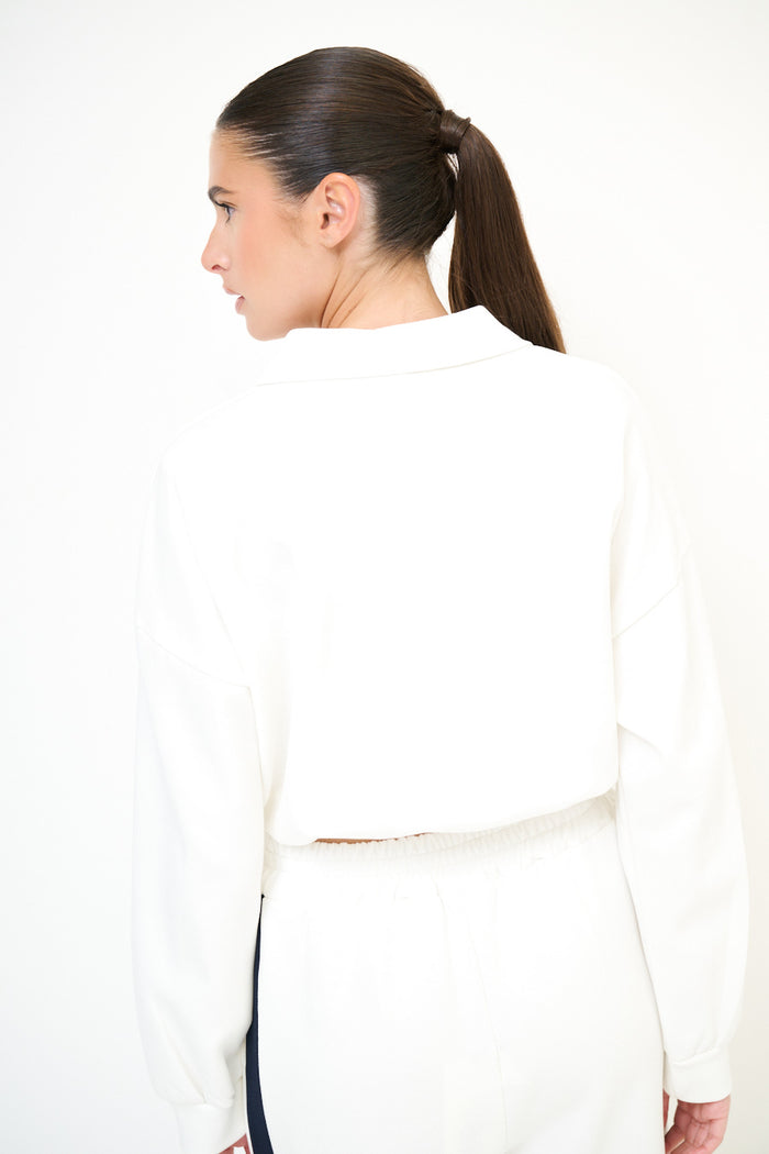 Cropped polo sweatshirt with gold button detail wholesale