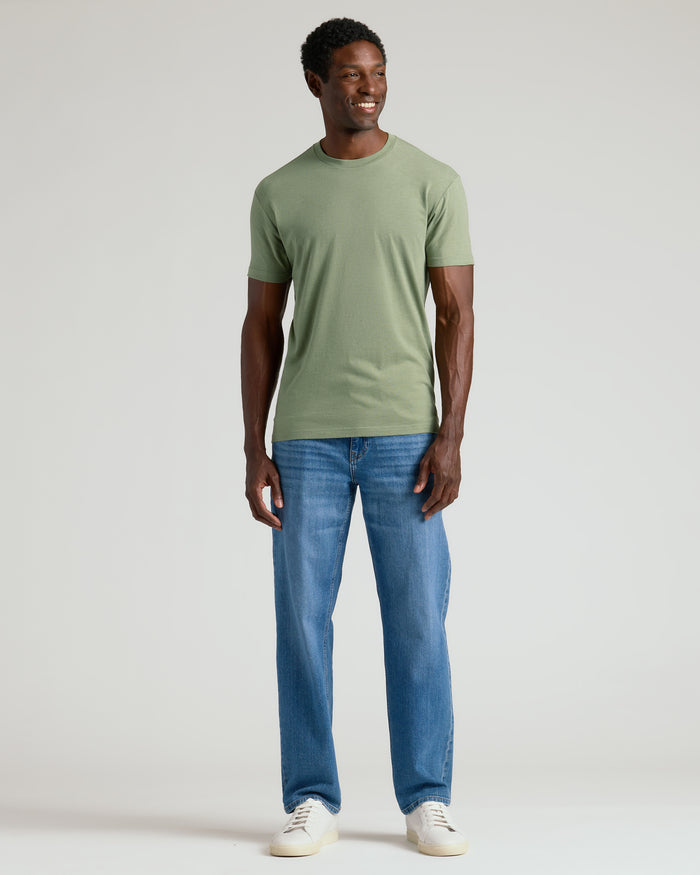 Man wearing Dark Heather Bay Green Classic Crew Neck t-shirt.