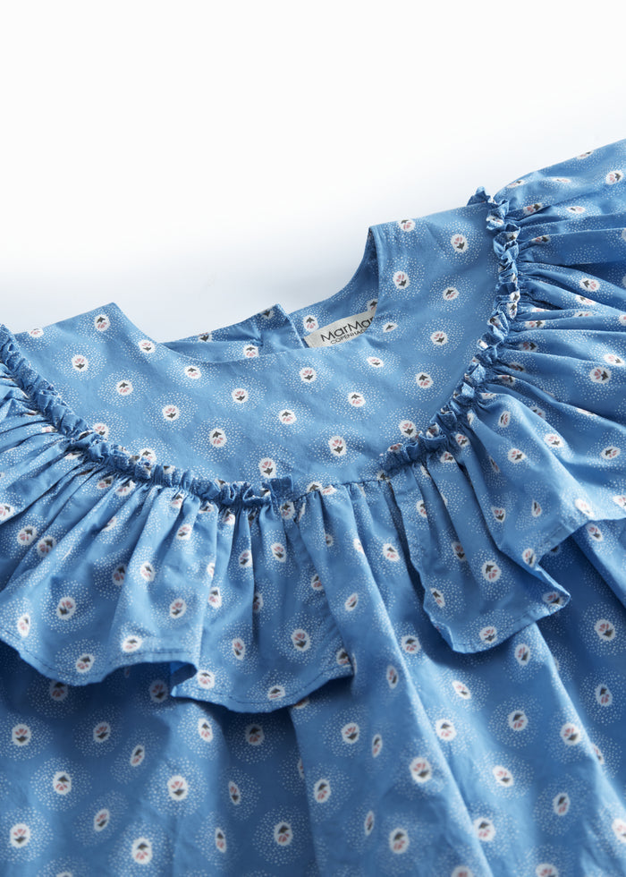 Blue children's dress with long sleeves, flounces, and small flowers.