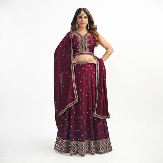 Kurti Connection USA wine sleeveless lehenga choli with silver embroidery and matching dupatta on a model