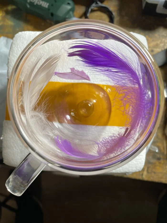 Feather filled double-layer glass cup