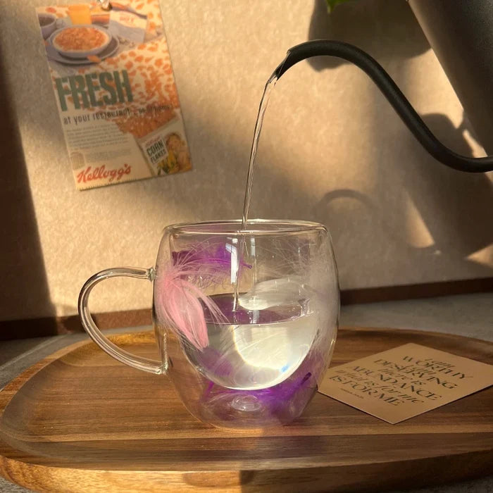 Feather filled double-layer glass cup