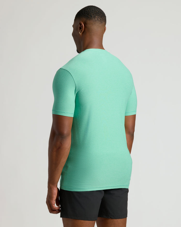 Man wearing Fern Tall Active Crew Neck 2.0, back view.