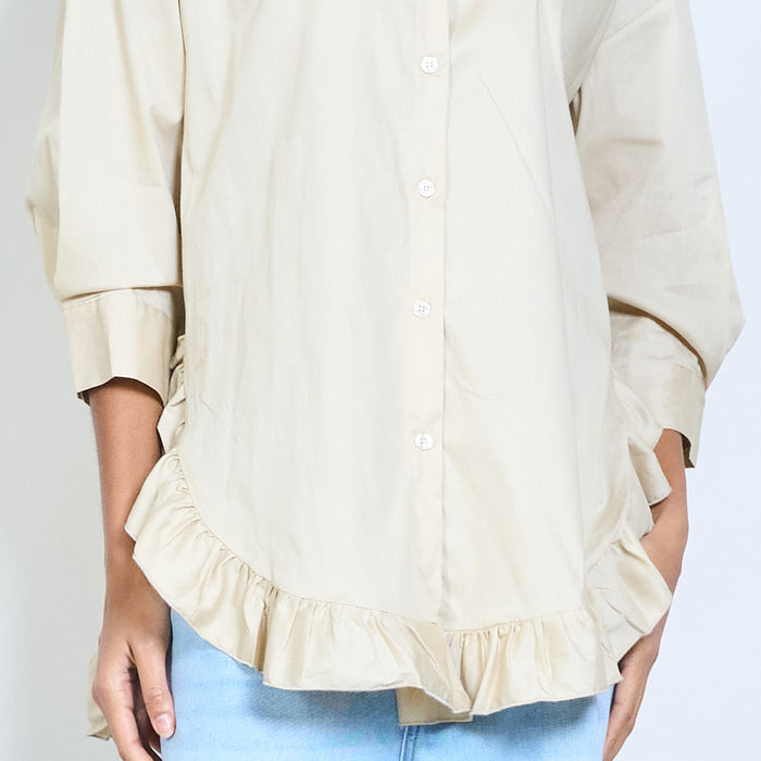 Flowy button-front shirt with ruffled hem detail and classic collar wholesale