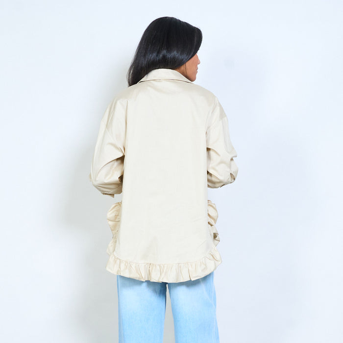 Flowy button-front shirt with ruffled hem detail and classic collar wholesale