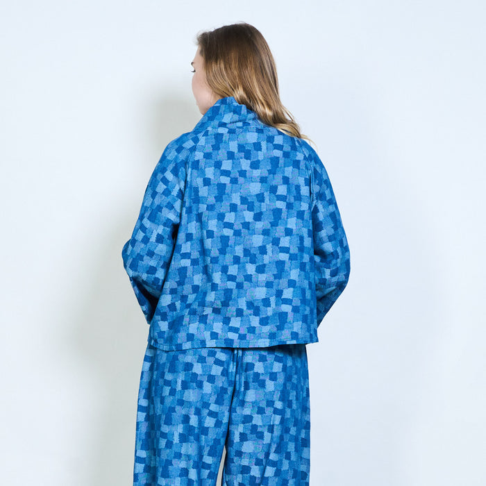 Geometric mosaic print asymmetric layered high neck blouse wholesale