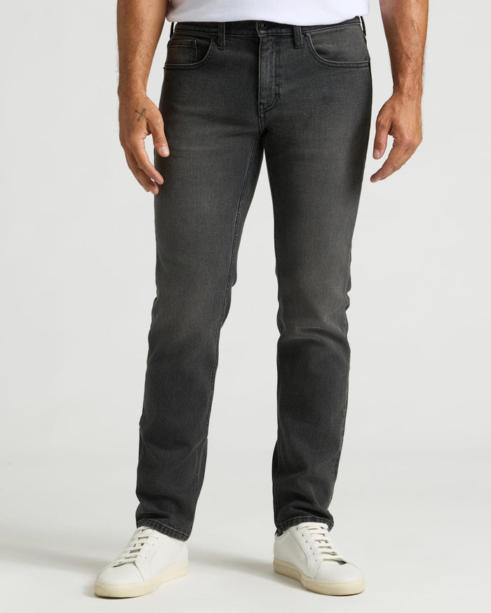 Gray Wash Slim Authentic Denim Jeans with white sneakers, classic style.