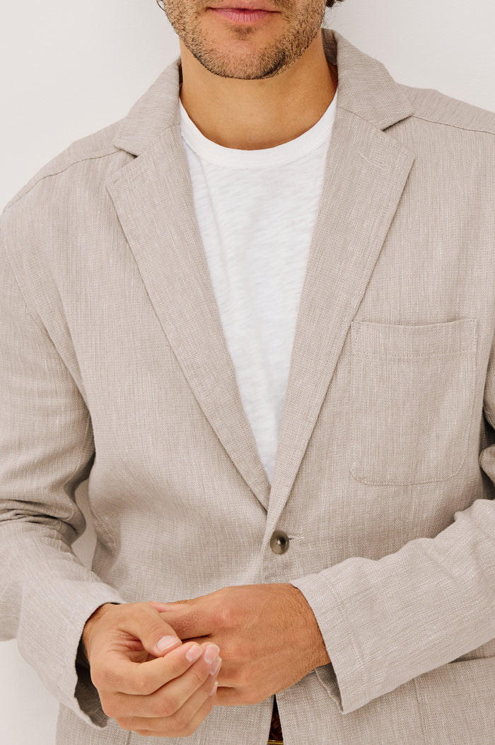 Harris Blazer in Cotton-Linen Blend With Single-Breasted Buttons, Straight Fit, Notched Lapels, and Front Patch Pockets in Sand Dune Colorway - Upper Body Front View Featured on Model