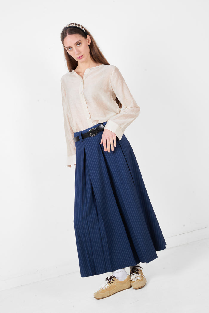 High waist pleated maxi skirt with subtle check pattern and fluid silhouette wholesale