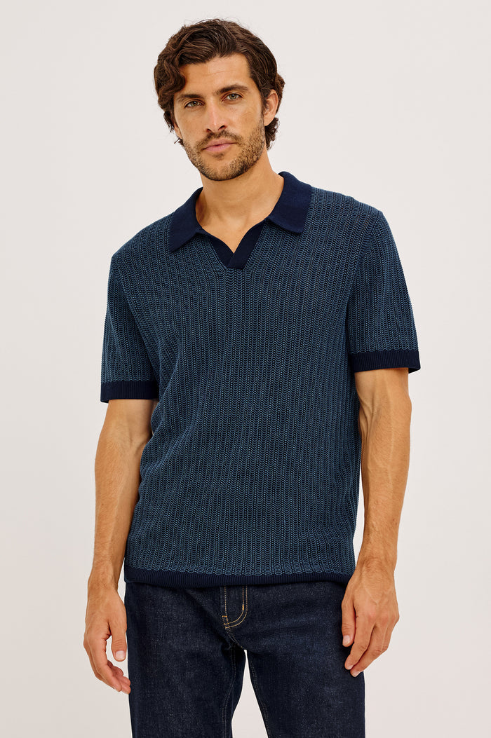 Langley Polo Shirt in Lightweight Contrast Open Birdseye Knit With Classic Fit, Open Collar, Short Sleeves, and Ribbed Trim in Navy Marine Ripple Colorway - Upper Body Front View Featured on Model