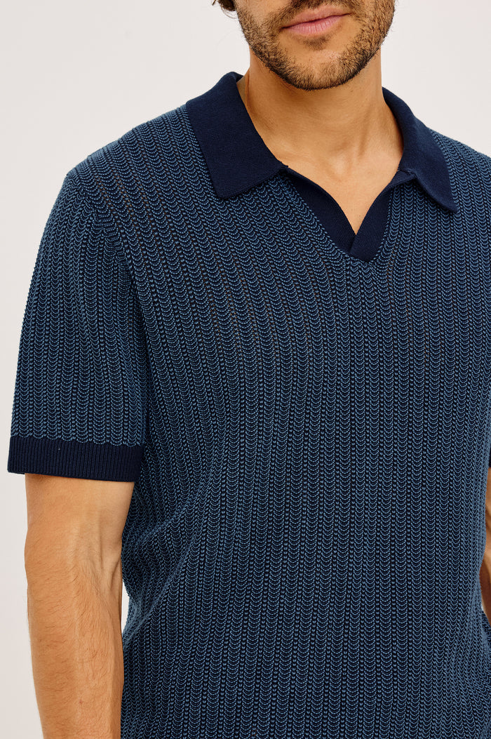 Langley Polo Shirt in Lightweight Contrast Open Birdseye Knit With Classic Fit, Open Collar, Short Sleeves, and Ribbed Trim in Navy Marine Ripple Colorway - Upper Body Front View Featured on Model