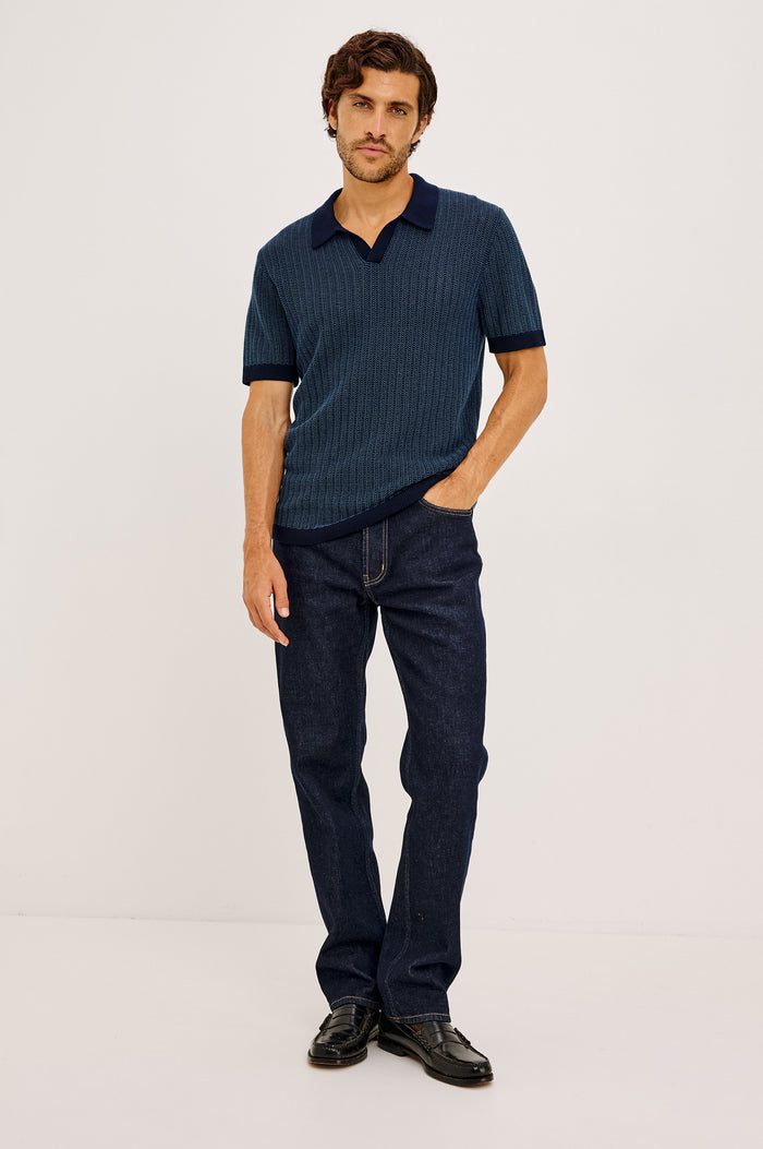 Langley Polo Shirt in Lightweight Contrast Open Birdseye Knit With Classic Fit, Open Collar, Short Sleeves, and Ribbed Trim in Navy Marine Ripple Colorway - Full Body Front View Featured on Model