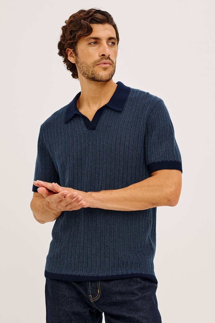 Langley Polo Shirt in Lightweight Contrast Open Birdseye Knit With Classic Fit, Open Collar, Short Sleeves, and Ribbed Trim in Navy Marine Ripple Colorway - Upper Body Front View Featured on Model