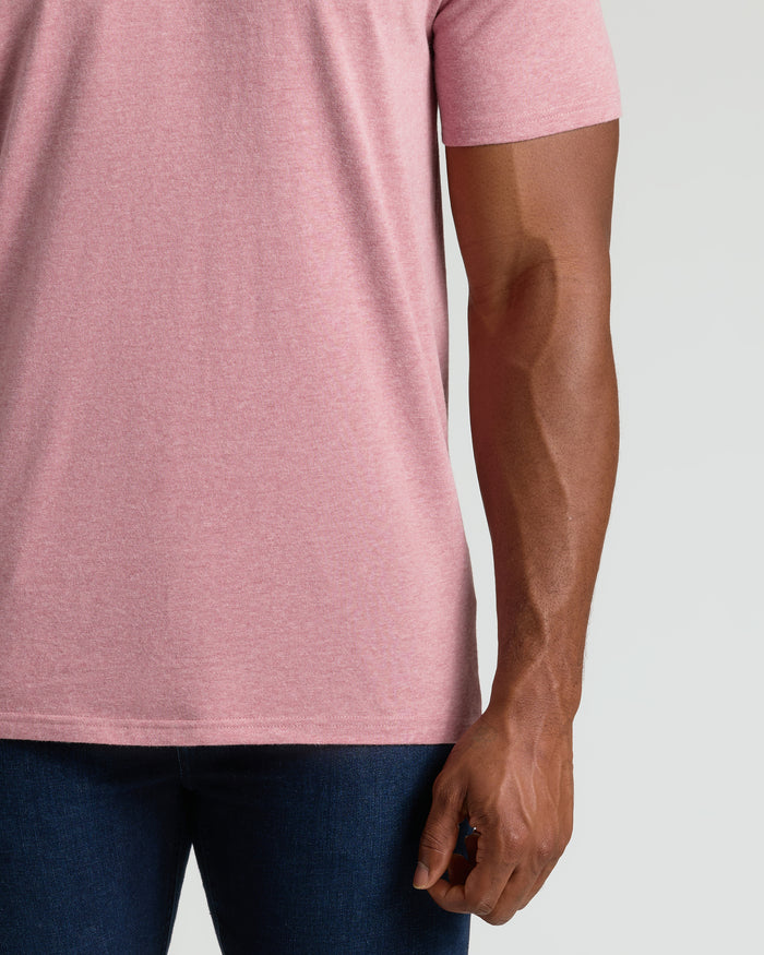 Light Heather Boysenberry Tall Crew Neck Tee with dark jeans visible.