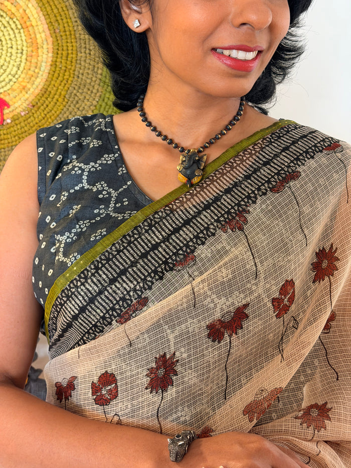 Mishrita Terracotta Petal Kota Saree