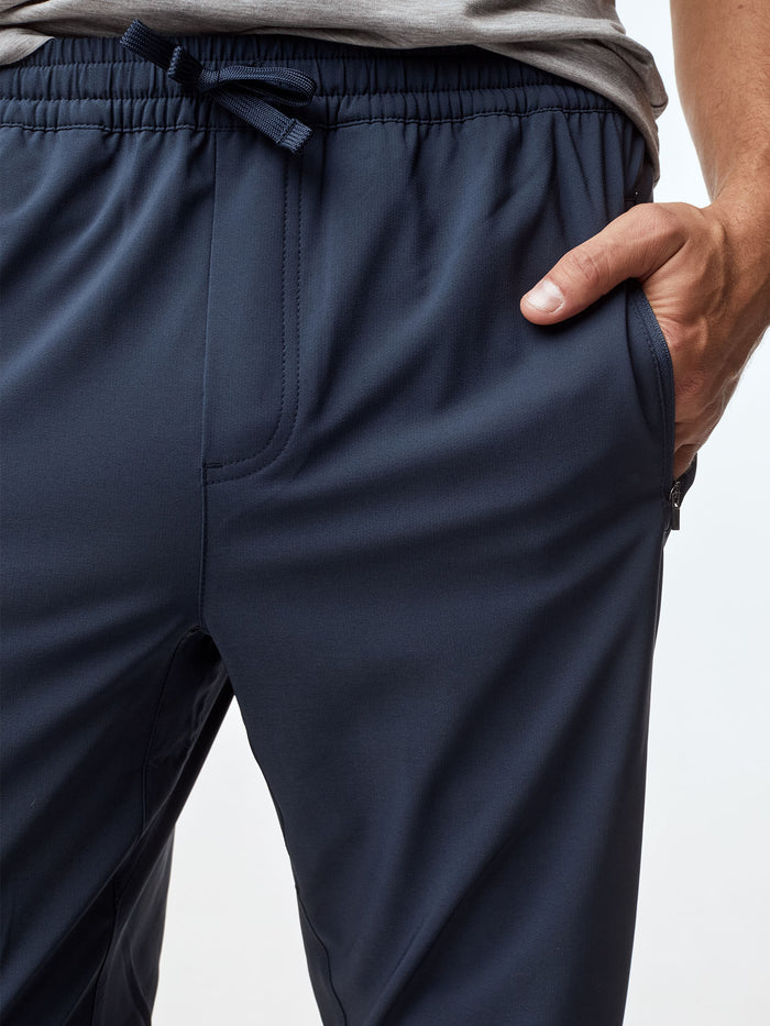 Adjustable drawstring and functional zip pockets # Crush Your Workouts with FCT's Performance Joggers - Navy + Black 2-Pack