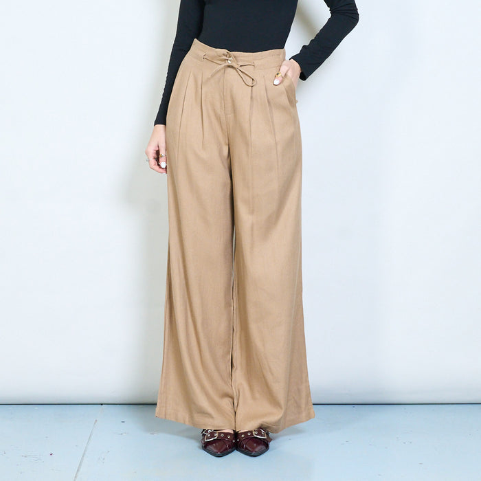 Pleated wide leg trousers with front button and tie detail wholesale