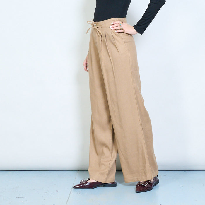 Pleated wide leg trousers with front button and tie detail wholesale