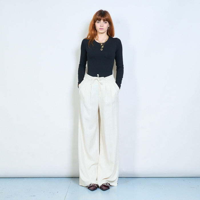Pleated wide leg trousers with front button and tie detail wholesale