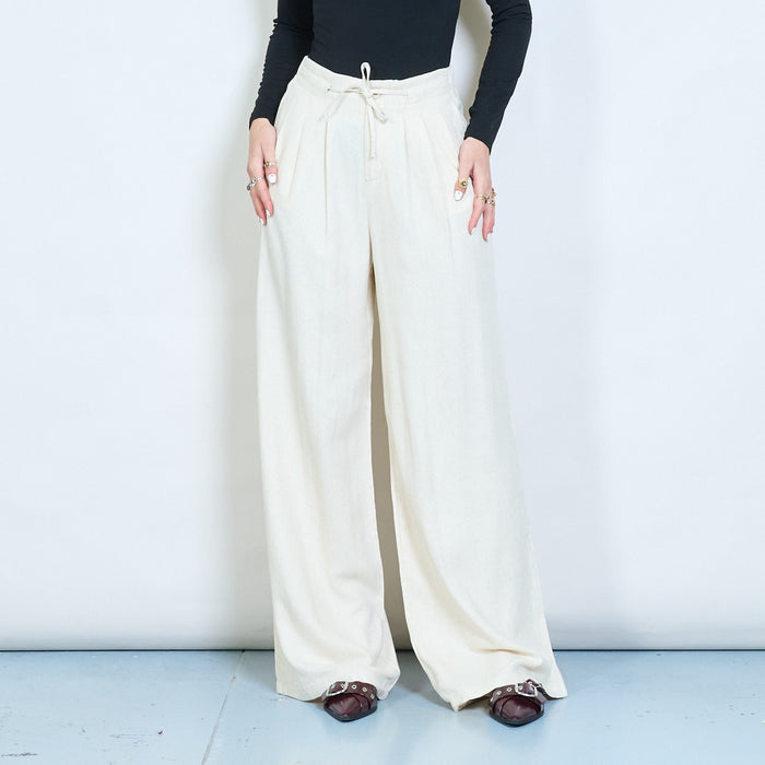 Pleated wide leg trousers with front button and tie detail wholesale