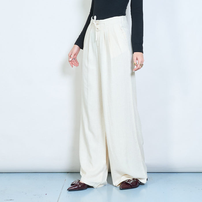 Pleated wide leg trousers with front button and tie detail wholesale