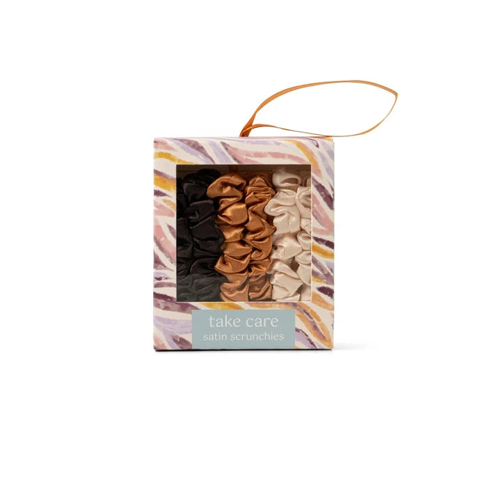 Take care satin scrunchies set in black brown and cream colors packaged in a decorative box