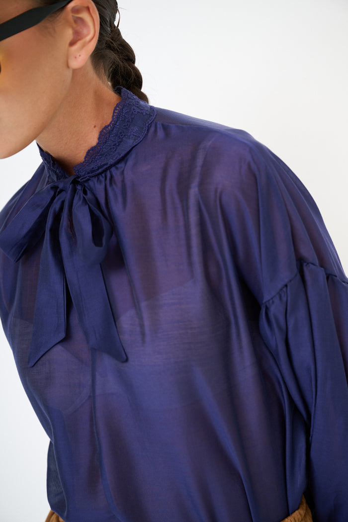 Sheer high neck blouse with bow tie detail wholesale