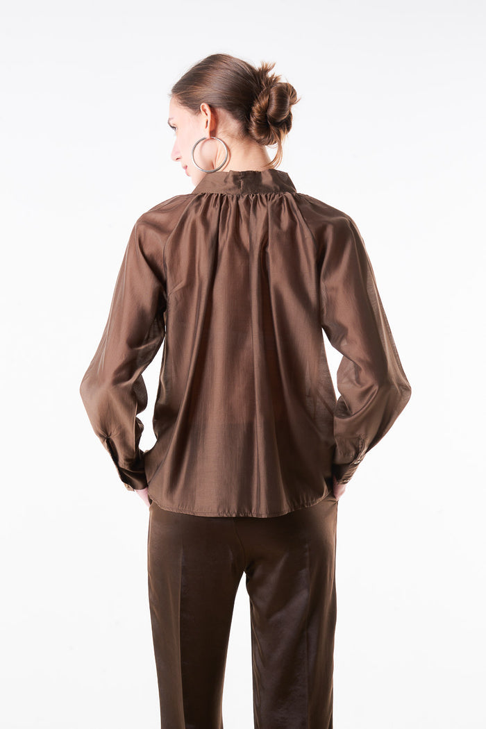 Sheer satin bow tie neck blouse with gathered neckline and elastic hem wholesale