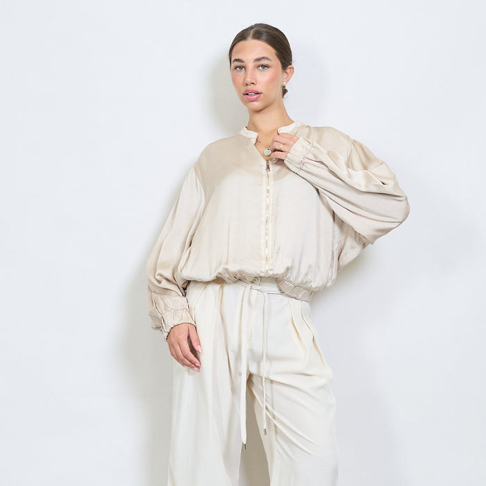 Silky bomber-style zip-up blouse with gathered hem wholesale