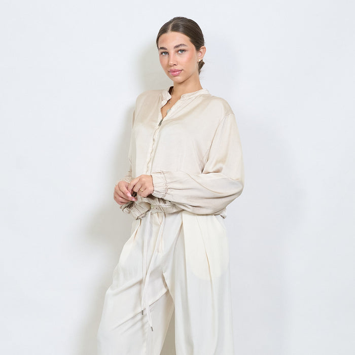 Silky bomber-style zip-up blouse with gathered hem wholesale