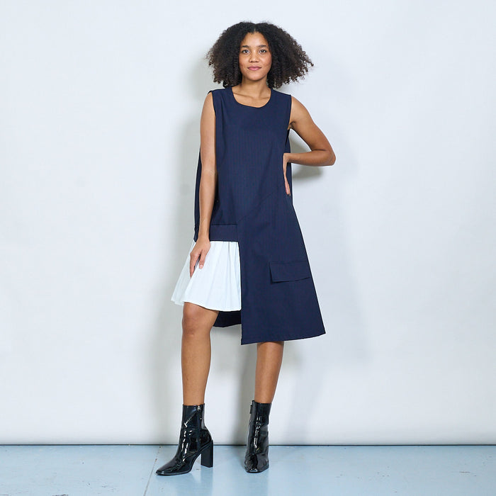 Sleeveless asymmetric dress with contrast pleats wholesale