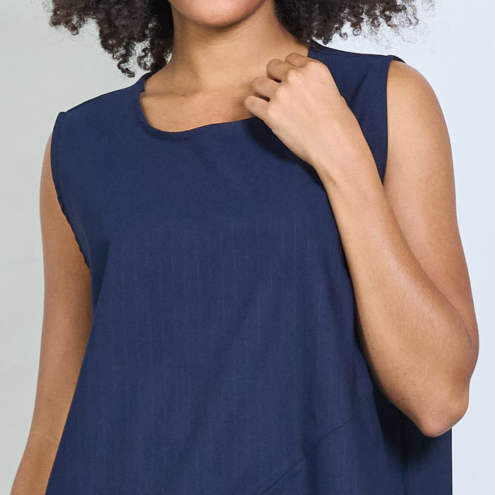 Sleeveless asymmetric dress with contrast pleats wholesale